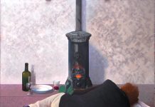 Man bij kachel 125 x 125 2012