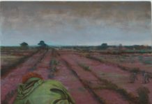 Rustende man in landschap